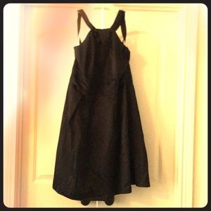 Black cocktail dress with pockets